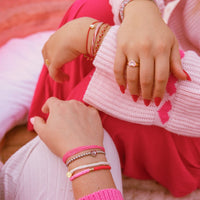 Pink and Red Vinyl Disc Bead Stretch Bracelet Set Gallery Thumbnail