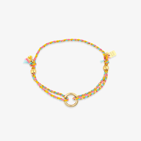 Colorful braided bracelet with gold accents on a white background